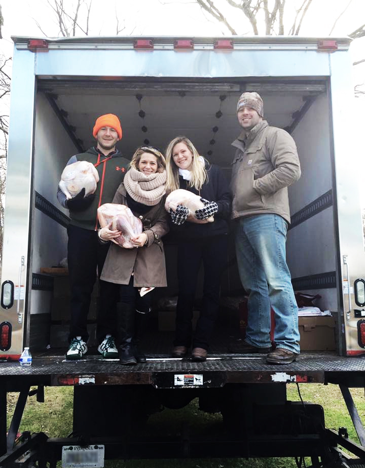 Family and customers on turkey pick up day at Spring Valley Turkey Farm